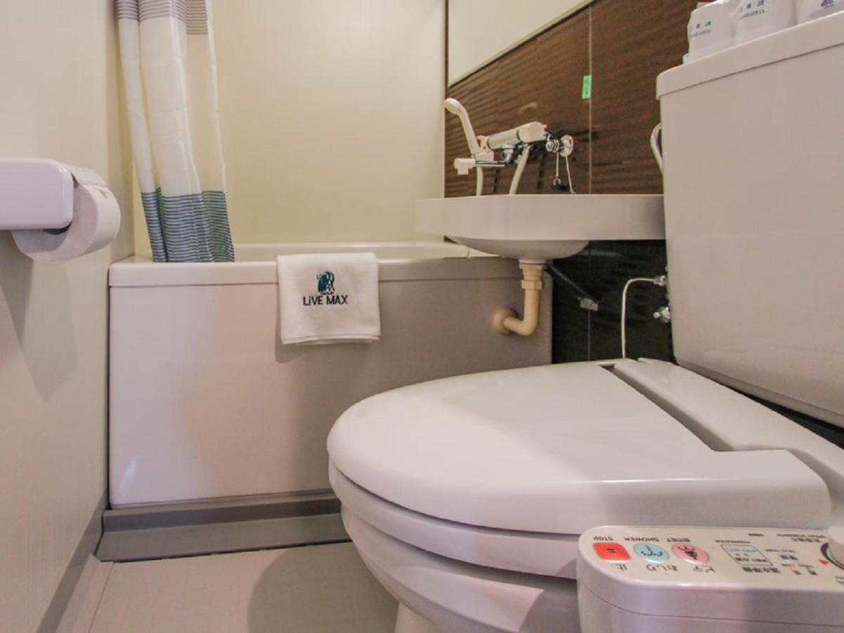 HOTEL LiVEMAX Umeda Doyama Osaka Bagian luar foto