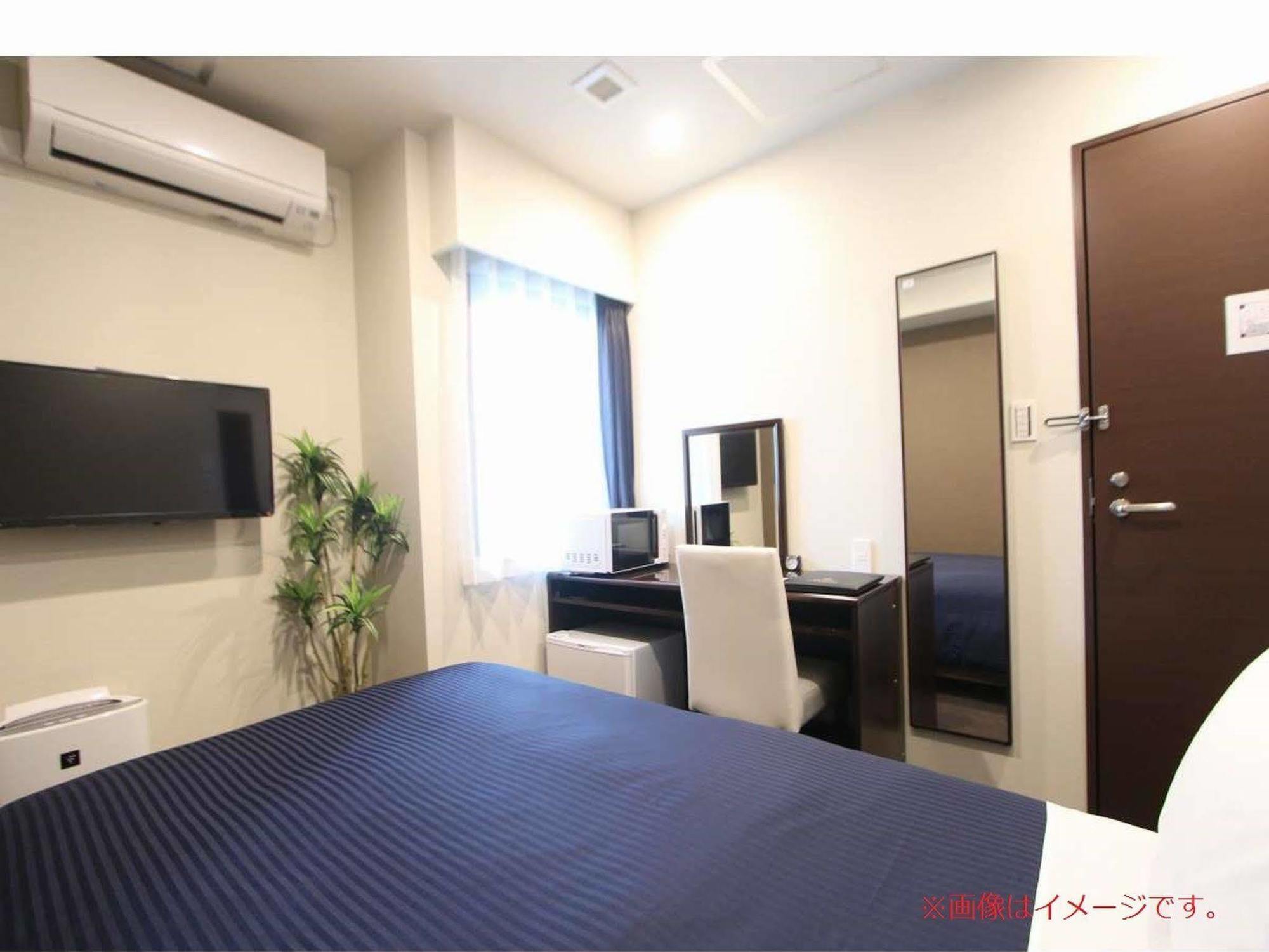 HOTEL LiVEMAX Umeda Doyama Osaka Bagian luar foto